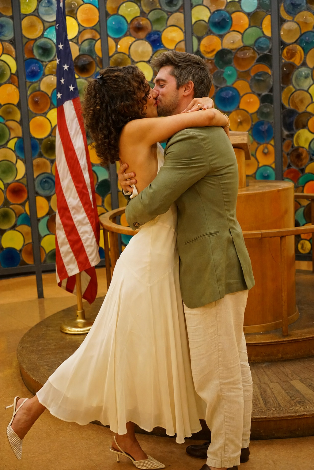 Elisa and Zack kissing at Brooklyn City Hall